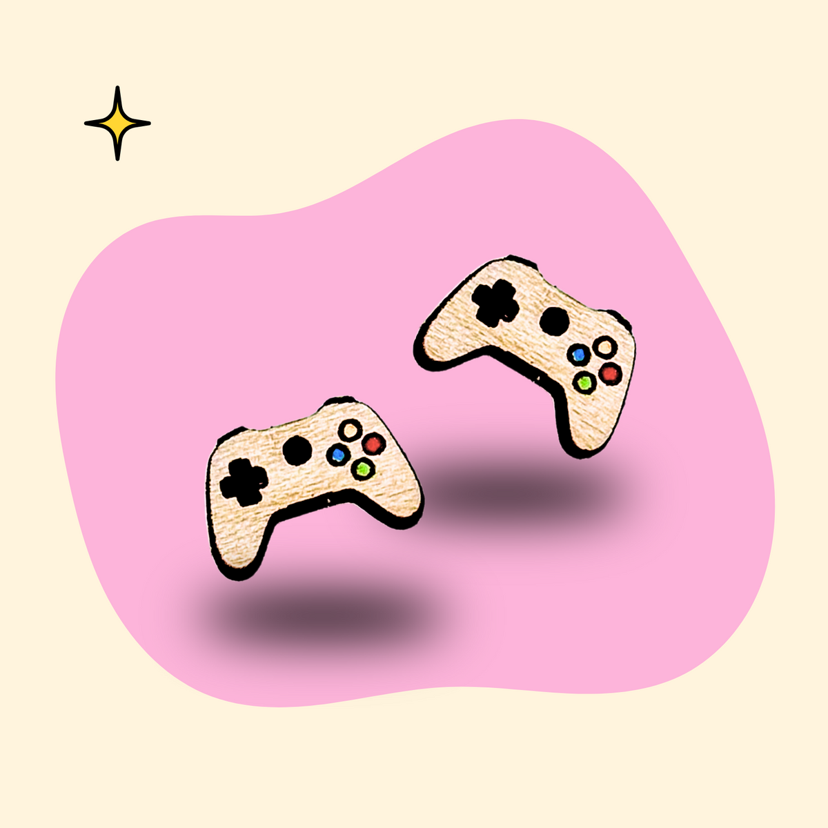 Hand-painted wooden game controller ear studs by GRAINN