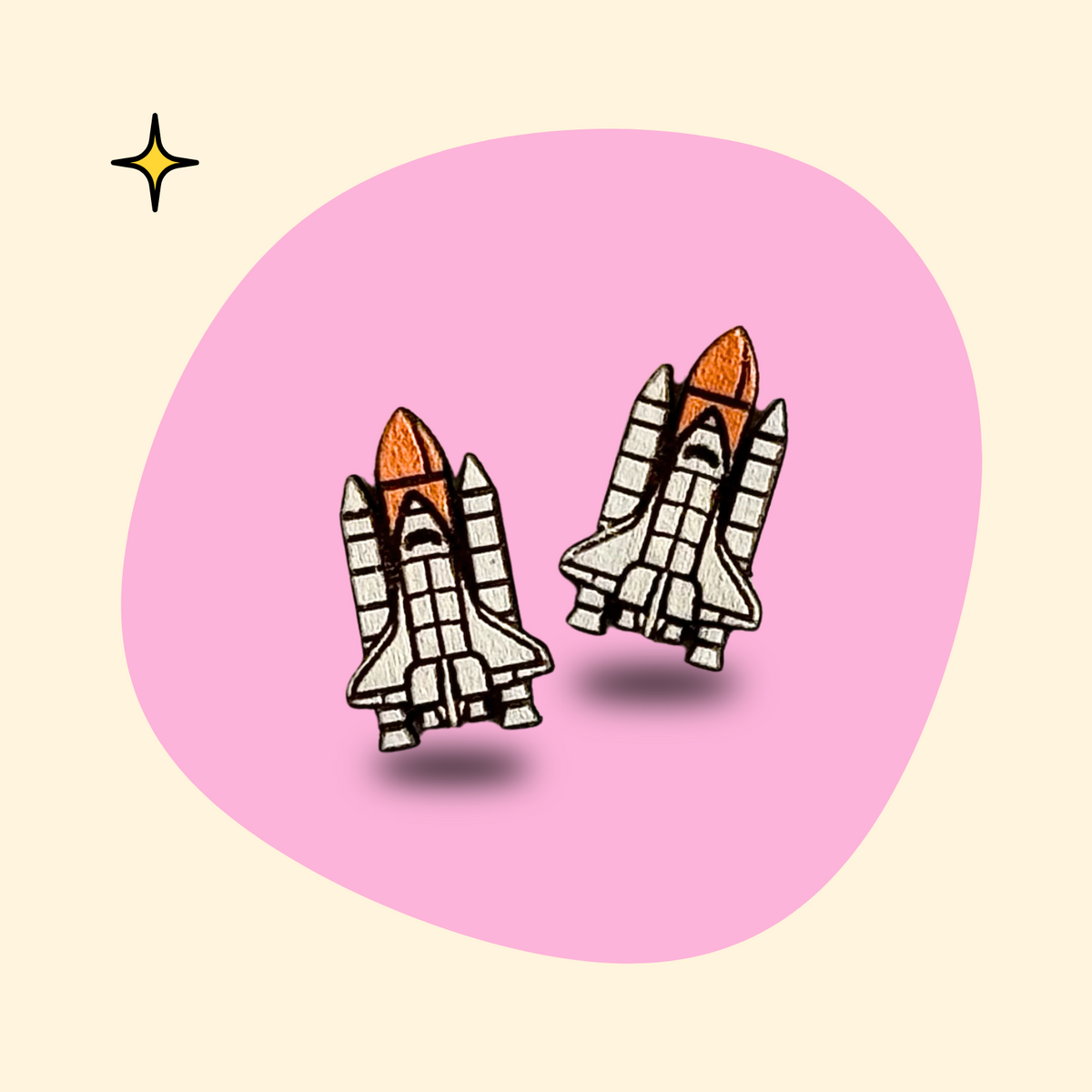 Hand-painted wooden rocket shuttle ear studs by GRAINN