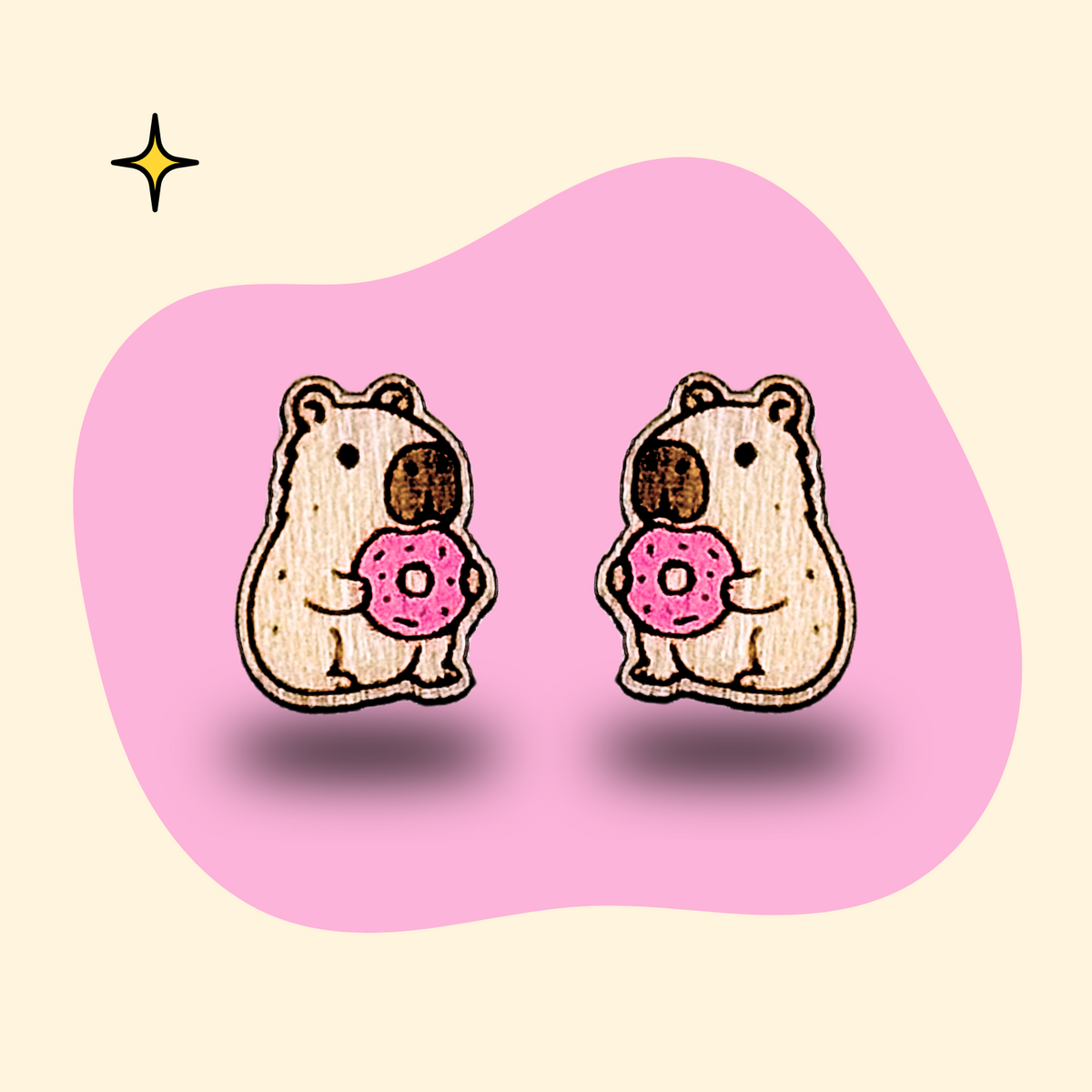 Hand-painted wooden capybara ear studs with donut by GRAINN