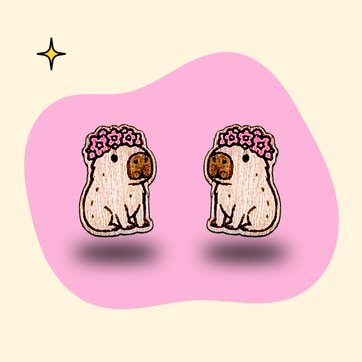 Hand-painted wooden capybara ear studs with flower crown by GRAINN