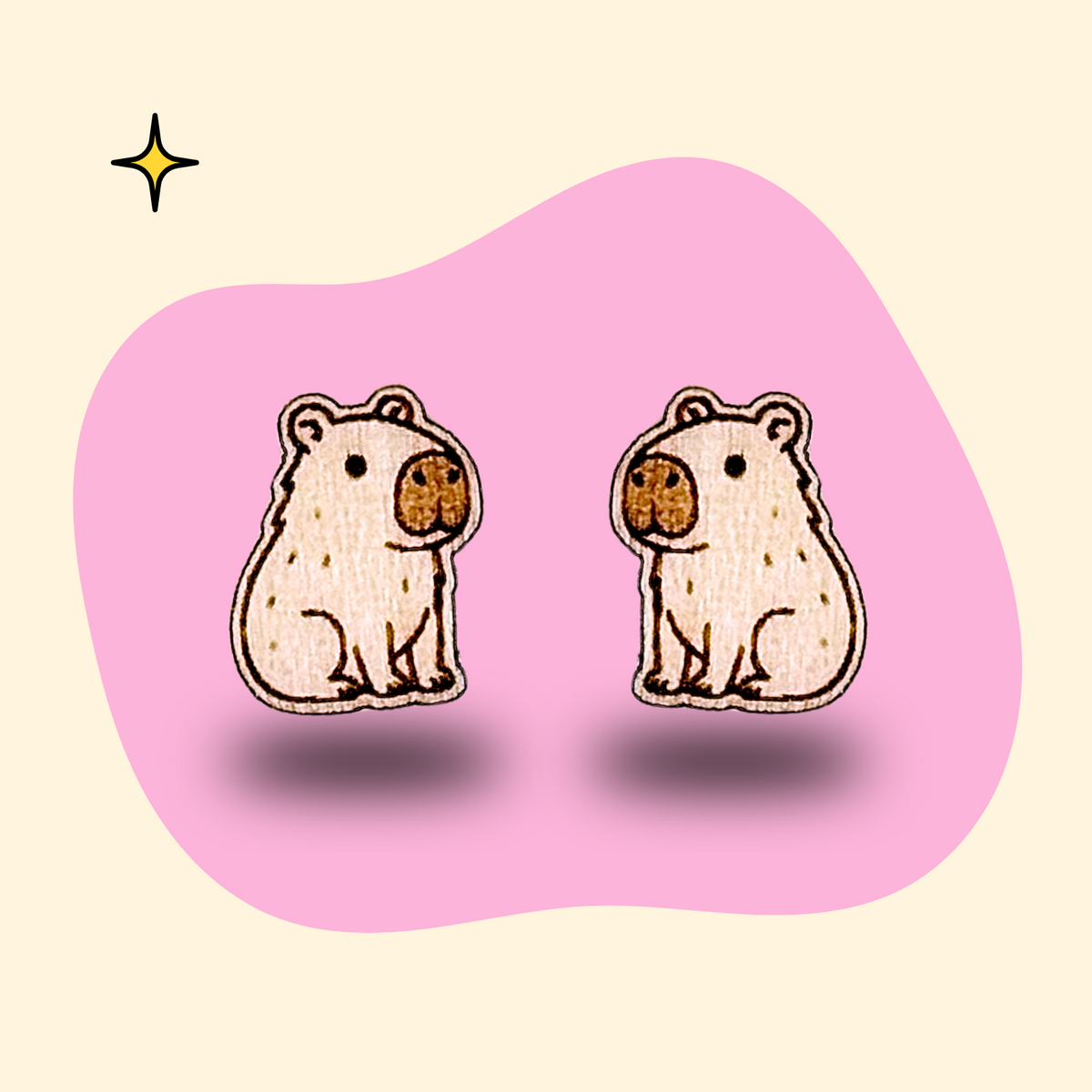 Hand-painted wooden capybara ear studs by GRAINN