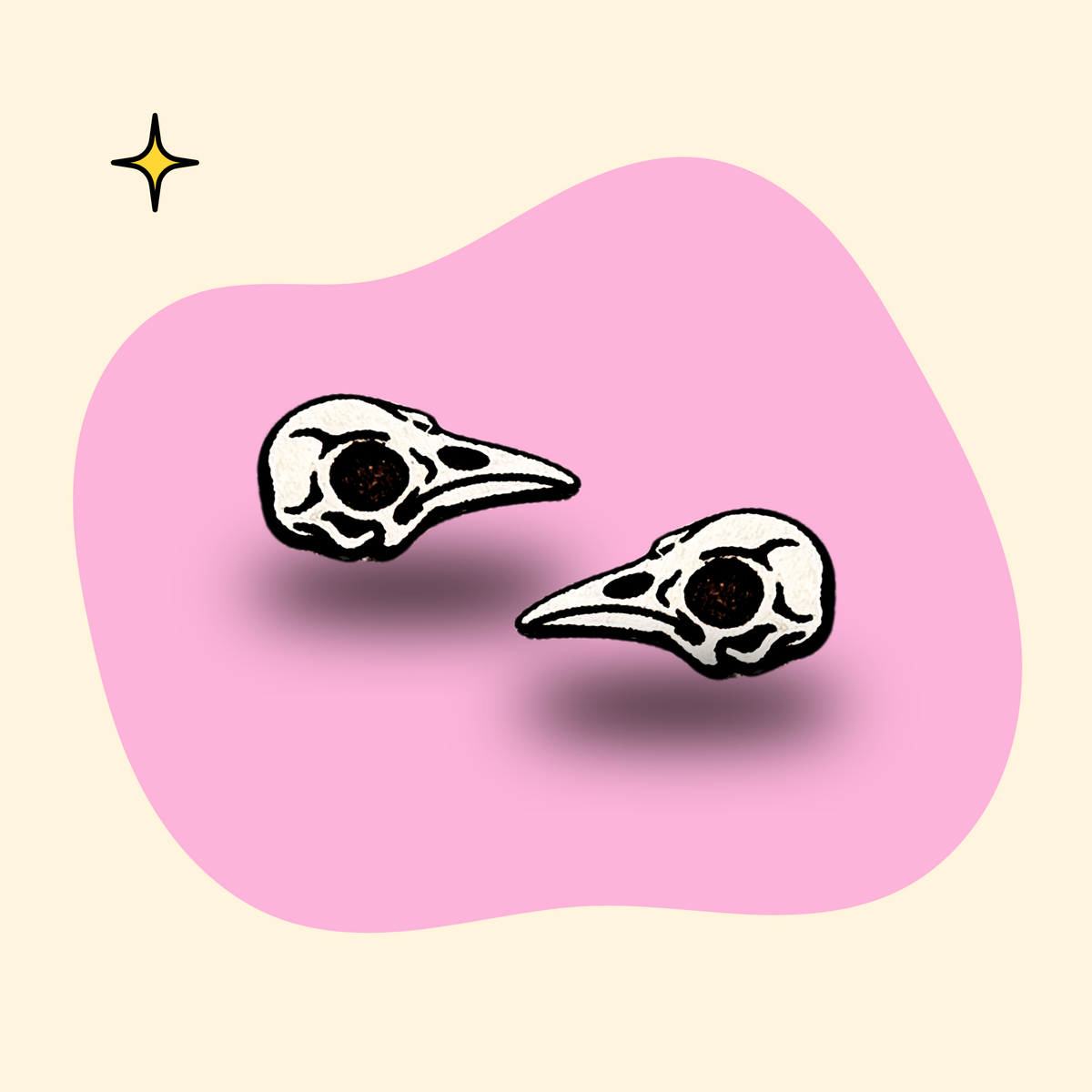 Hand-painted wooden bird skull ear studs in black and white by GRAINN