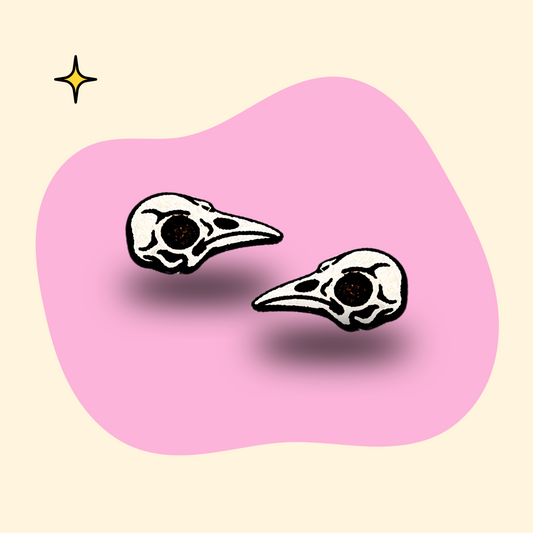 Hand-painted wooden bird skull ear studs in black and white by GRAINN