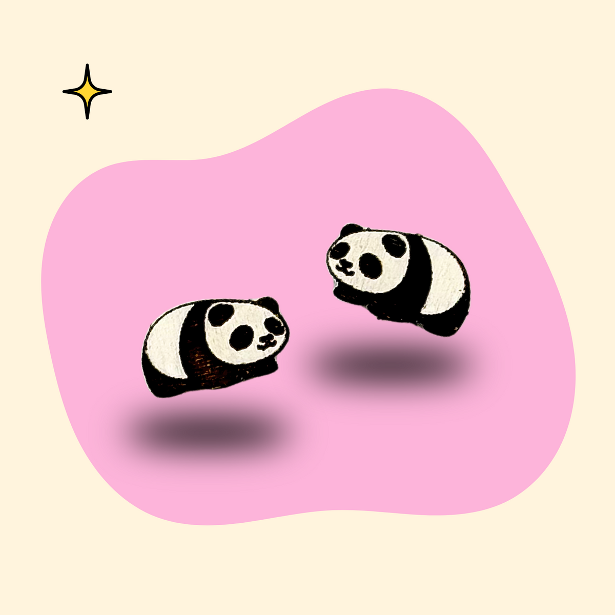 Hand-painted wooden panda ear studs by GRAINN